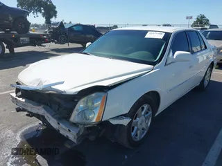2007 Cadillac DTS Luxury I z VIN 1G6KD57Y77U133267, wystawiony jako IAAI lot #42337188 z przebiegiem 126 063 mil mil oraz . Historia ofert i sprzedaży dostępna na DreamBid. Obrazek 18.