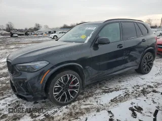 2022 BMW X5 M with VIN 5YMJU0C0XN9M56926, listed as a Copart auction lot 88771915 with 9,802 mi miles and Salvage Title. Bid and sale history available at carsss.com. Image 1.