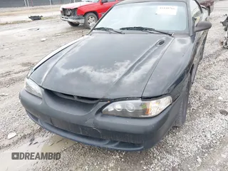 1997 Ford Mustang with VIN 1FALP4041VF129619, listed as a IAAI auction lot 41440766 with 135,934 mi miles. Bid and sale history available at carsss.com. Image 6.