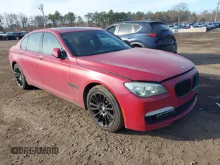 2014 BMW 7 Series 750i xDrive with VIN WBAYB6C55ED224496, listed as a IAAI auction lot 41471012 with 131,851 mi miles. Bid and sale history available at carsss.com. Image 1.
