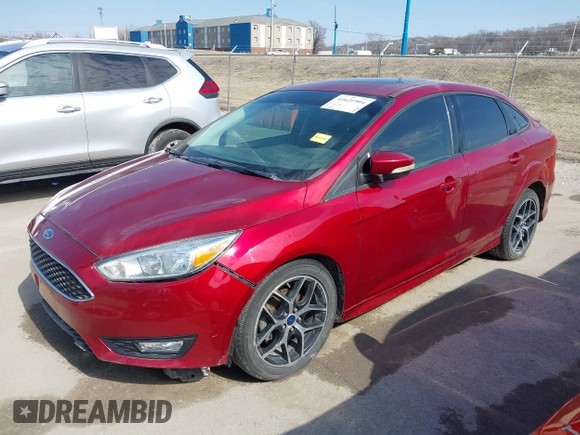 2015 Ford Focus SE with VIN 1FADP3F24FL362949, listed as a IAAI auction lot 41621904 with 104,447 mi miles. Bid and sale history available at carsss.com. Image 2.
