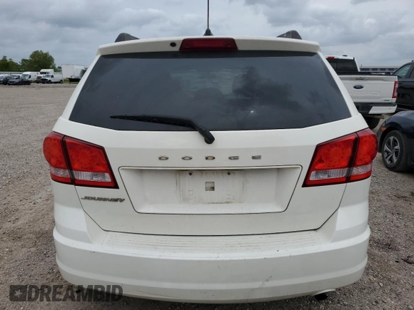 2014 Dodge Journey SE with VIN 3C4PDCAB7ET240936, listed as a Copart auction lot 55115645 with 242,155 mi miles and Salvage title. Bid and sale history available at DreamBid. Image 6.