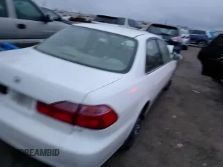 1999 Honda Accord LX с VIN JHMCG5540XC034223, выставлен на аукционе Copart как лот 83922254 с пробегом Не указан миль и Списание • Salvage title. История ставок и продаж доступна на DreamBid. Изображение 11.