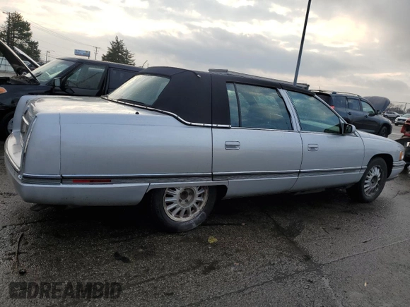 1994 Cadillac Concours z VIN 1G6KF52Y3RU231877, wystawiony jako Copart lot #82150174 z przebiegiem 76 279 mil mil oraz Szkody całkowita. Historia ofert i sprzedaży dostępna na DreamBid. Obrazek 3.