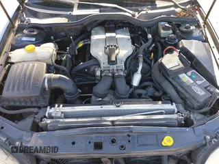 2000 Cadillac Catera z VIN W06VR54R3YR029454, wystawiony jako IAAI lot #42371242 z przebiegiem 166 182 mil mil oraz . Historia ofert i sprzedaży dostępna na DreamBid. Obrazek 10.
