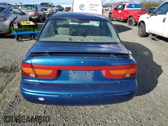 2000 Saturn SL z VIN 1G8ZK5279YZ155916, wystawiony jako Copart lot #44225105 z przebiegiem 97 788 mil mil oraz Szkoda całkowita • Salvage title. Historia ofert i sprzedaży dostępna na DreamBid. Obrazek 6.