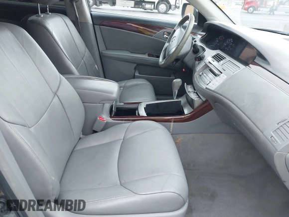 2010 Toyota Avalon XL with VIN 4T1BK3DB2AU368105, listed as a IAAI auction lot 40966346 with 147,122 mi miles and . Bid and sale history available at DreamBid. Image 5.