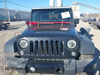 2016 Jeep Wrangler Unlimited Sport with VIN 1C4BJWDG0GL123581, listed as a IAAI auction lot 41426577 with 102,301 mi miles and . Bid and sale history available at DreamBid. Image 12.