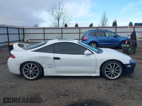 1999 Mitsubishi Eclipse with VIN 4A3AK44Y1XE024579, listed as a IAAI auction lot 41890364 with 256,956 mi miles and . Bid and sale history available at DreamBid. Image 13.