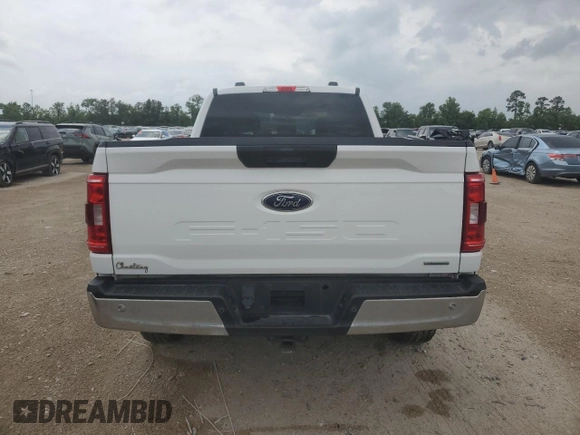 2022 Ford F-150 XL with VIN 1FTFW1E82NFA51713, listed as a Copart auction lot 54581755 with 69,966 mi miles and Salvage Title. Bid and sale history available at DreamBid. Image 6.
