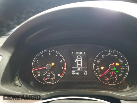 2012 Volkswagen Passat SE z VIN 1VWBP7A36CC002082, wystawiony jako Copart lot #60692375 z przebiegiem 154 980 mil mil oraz Szkoda całkowita • Salvage title. Historia ofert i sprzedaży dostępna na DreamBid. Obrazek 9.