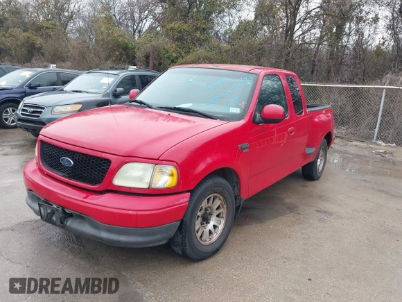 2003 Ford F-150 XL with VIN 1FTRX07W73KD62770, listed as a IAAI auction lot 41451484 with Not provided miles and . Bid and sale history available at DreamBid. Image 2.