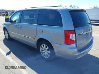 2013 Chrysler Town & Country Touring with VIN 2C4RC1BG9DR777819, listed as a IAAI auction lot 41824692 with 138,702 mi miles. Bid and sale history available at carsss.com. Image 3.