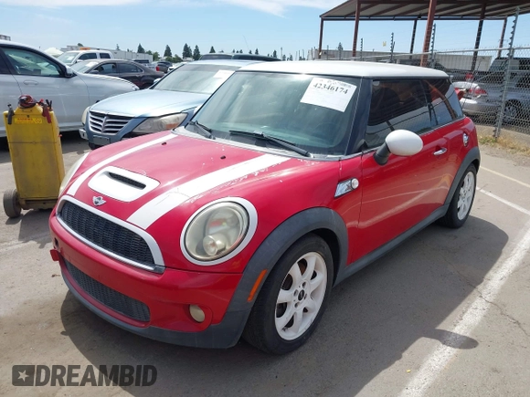 2009 MINI Hardtop S with VIN WMWMF73559TW87548, listed as a IAAI auction lot 42346174 with 132,361 mi miles and . Bid and sale history available at DreamBid. Image 2.