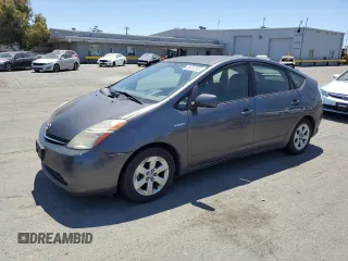 2007 Toyota Prius z VIN JTDKB20U473224169, wystawiony jako Copart lot #63018245 z przebiegiem 226 508 mil mil oraz Szkoda całkowita • Salvage title. Historia ofert i sprzedaży dostępna na DreamBid. Obrazek 1.