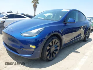 2022 Tesla Model Y Performance z VIN 7SAYGDEF7NF393235, wystawiony jako IAAI lot #42106027 z przebiegiem 50 959 mil mil oraz . Historia ofert i sprzedaży dostępna na DreamBid. Obrazek 2.