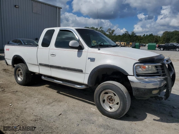 1999 Ford F-150 Work Series with VIN 1FTRX18W2XNC00196, listed as a Copart auction lot 72536444 with 0 mi miles and Non Repairable. Bid and sale history available at carsss.com. Image 4.