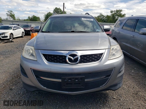 2011 Mazda CX-9 Touring z VIN JM3TB3CV3B0323789, wystawiony jako Copart lot #57762505 z przebiegiem 151 942 mil mil oraz Czysty tytuł • Clean title. Historia ofert i sprzedaży dostępna na DreamBid. Obrazek 5.