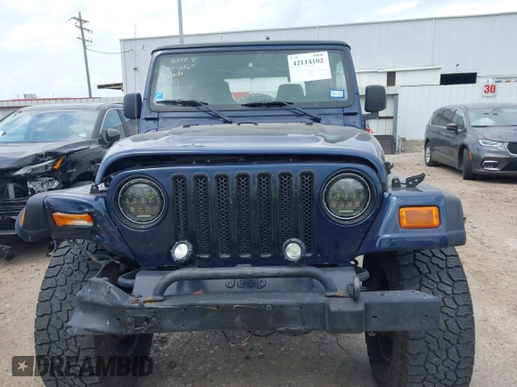 2005 Jeep Wrangler X with VIN 1J4FA39S15P320367, listed as a IAAI auction lot 42114102 with 142,132 mi miles and . Bid and sale history available at DreamBid. Image 12.