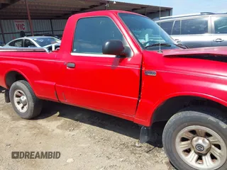 2002 Mazda B-Series Truck SX with VIN 4F4YR12D02TM01264, listed as a IAAI auction lot 41908459 with 205,445 mi miles and . Bid and sale history available at DreamBid. Image 14.