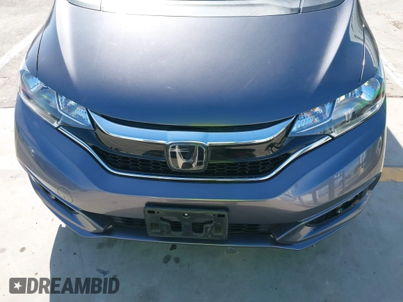 2019 Honda Fit EX-L z VIN 3HGGK5H01KM721343, wystawiony jako IAAI lot #41945425 z przebiegiem 23 312 mil mil oraz . Historia ofert i sprzedaży dostępna na DreamBid. Obrazek 12.