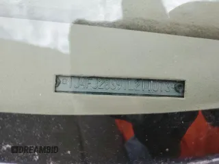 1996 Jeep Cherokee SE z VIN 1J4FJ28S9TL211073, wystawiony jako Copart lot #78052574 z przebiegiem 174 967 mil mil oraz Nie do naprawy • Non repairable. Historia ofert i sprzedaży dostępna na DreamBid. Obrazek 14.