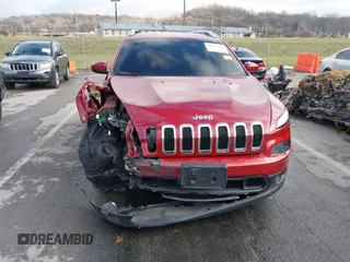 2016 Jeep Cherokee Latitude with VIN 1C4PJLCS1GW239526, listed as a IAAI auction lot 41117287 with 121,928 mi miles. Bid and sale history available at carsss.com. Image 13.
