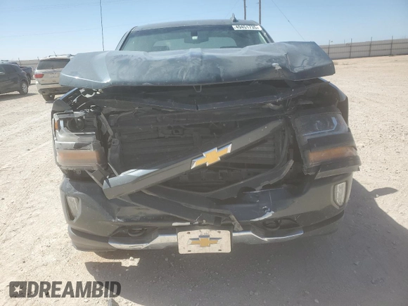 2018 Chevrolet Silverado 1500 LT with VIN 3GCUKREC2JG259864, listed as a Copart auction lot 49451735 with 146,576 mi miles and Salvage Title. Bid and sale history available at DreamBid. Image 5.