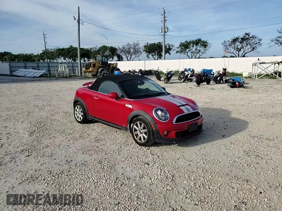 2013 MINI Roadster S z VIN WMWSY3C56DT593875, wystawiony jako Copart lot #74982124 z przebiegiem 64 622 mil mil oraz Szkody całkowita. Historia ofert i sprzedaży dostępna na DreamBid. Obrazek 10.