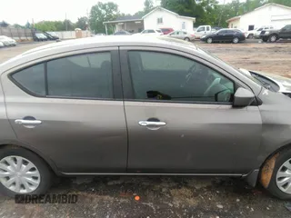 2015 Nissan Versa SV with VIN 3N1CN7AP7FL869485, listed as a IAAI auction lot 42077524 with 198,646 mi miles. Bid and sale history available at carsss.com. Image 13.