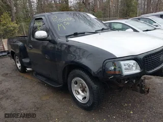 1998 Ford F-150 Standard with VIN 1FTZF1727WNC34697, listed as a IAAI auction lot 41512105 with 140,577 mi miles. Bid and sale history available at carsss.com. Image 1.