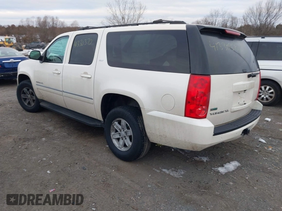 2012 GMC Yukon XL SLT with VIN 1GKS2KE79CR252581, listed as a IAAI auction lot 41330370 with 158,736 mi miles. Bid and sale history available at carsss.com. Image 3.