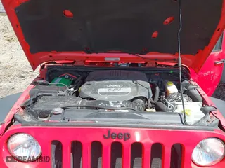2013 Jeep Wrangler Sahara with VIN 1C4AJWBG8DL581783, listed as a IAAI auction lot 42126522 with 40,101 mi miles. Bid and sale history available at carsss.com. Image 10.
