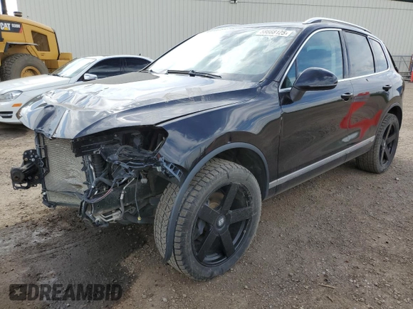 2015 Volkswagen Touareg Sport with VIN WVGEF9BP3FD004771, listed as a Copart auction lot 58668125 with 64,422 mi miles and Clean title. Bid and sale history available at DreamBid. Image 1.