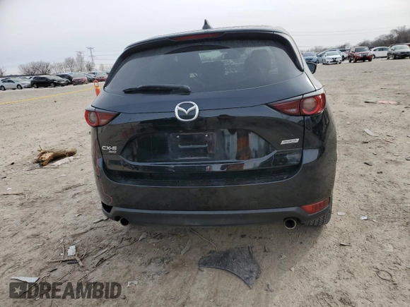 2018 Mazda CX-5 Touring with VIN JM3KFBCM2J0427786, listed as a Copart auction lot 45539345 with 62,989 mi miles and Salvage Title. Bid and sale history available at carsss.com. Image 6.