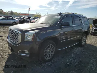 2015 GMC Yukon Denali with VIN 1GKS2CKJ9FR727818, listed as a Copart auction lot 50410655 with 0 mi miles and Salvage Title. Bid and sale history available at carsss.com. Image 1.