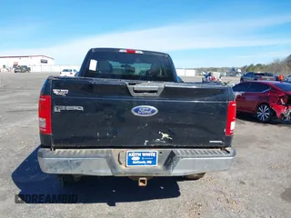 2016 Ford F-150 XL with VIN 1FTEX1C84GFB41427, listed as a IAAI auction lot 41726380 with 184,731 mi miles and . Bid and sale history available at carsss.com. Image 16.