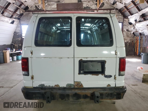 2014 Ford Econoline Cargo Commercial with VIN 1FTNE2EW6EDA20317, listed as a Copart auction lot 52769315 with 333,250 mi miles and Clean Title. Bid and sale history available at carsss.com. Image 6.