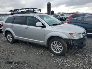 2013 Dodge Journey SXT with VIN 3C4PDDBG4DT571262, listed as a Copart auction lot 86795494 with 163,699 mi miles and Salvage title. Bid and sale history available at DreamBid. Image 4.