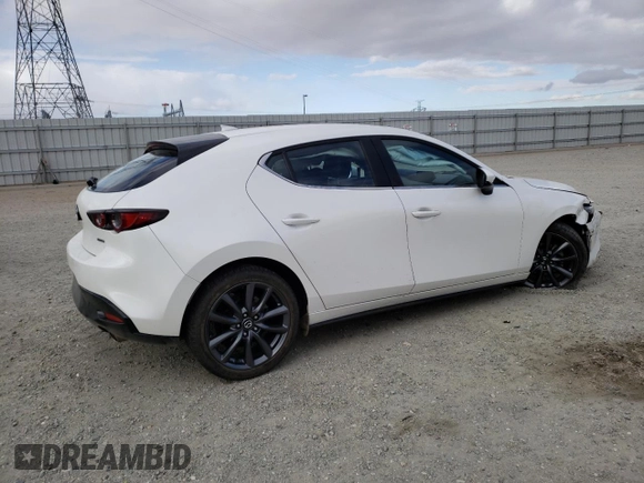 2019 Mazda Mazda3 Hatchback w/Preferred Pkg with VIN JM1BPAMM8K1135019, listed as a Copart auction lot 42312553 with 59,721 mi miles. Bid and sale history available at carsss.com. Image 3.