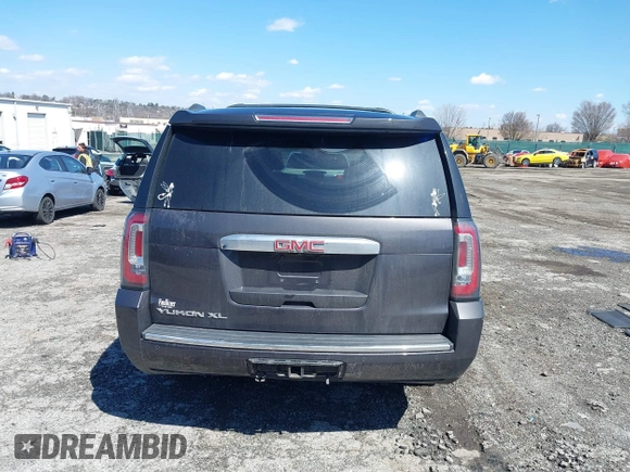 2015 GMC Yukon XL Denali with VIN 1GKS2JKJ5FR144991, listed as a IAAI auction lot 41877853 with 167,814 mi miles. Bid and sale history available at carsss.com. Image 17.