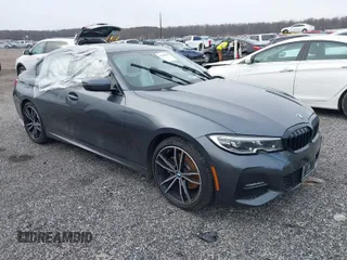 2019 BMW 3 Series 330i xDrive with VIN WBA5R7C54KFH24284, listed as a IAAI auction lot 41246406 with 57,200 mi miles. Bid and sale history available at carsss.com. Image 1.