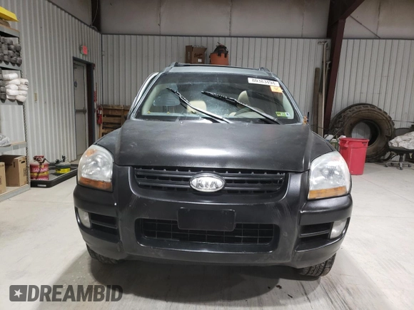 2005 Kia Sportage LX with VIN KNDJE723857118317, listed as a Copart auction lot 80383494 with 91,084 mi miles and Salvage Title. Bid and sale history available at carsss.com. Image 5.