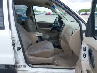 2003 Ford Escape XLT Popular 2 с VIN 1FMYU93133KD21454, выставлен на аукционе IAAI как лот 42386150 с пробегом 182 849 миль миль и . История ставок и продаж доступна на DreamBid. Изображение 5.