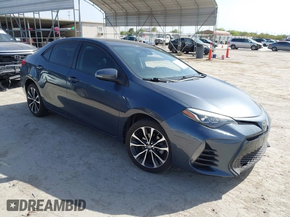 2019 Toyota Corolla L with VIN 5YFBURHE9KP910059, listed as a IAAI auction lot 41856905 with 104,096 mi miles and . Bid and sale history available at DreamBid. Image 1.