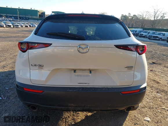 2021 Mazda CX-30 Premium with VIN 3MVDMBDY2MM236118, listed as a IAAI auction lot 41182309 with 32,286 mi miles and . Bid and sale history available at carsss.com. Image 15.