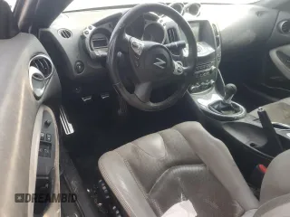 2012 Nissan 370Z с VIN JN1AZ4EH6CM562615, выставлен на аукционе Copart как лот 47623125 с пробегом 86 468 миль миль и Списание • Salvage title. История ставок и продаж доступна на DreamBid. Изображение 8.