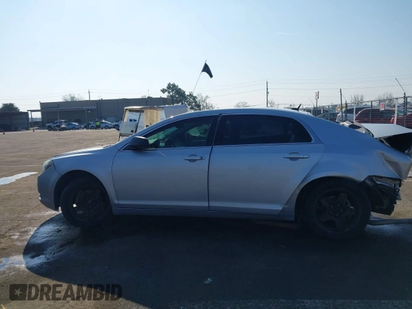 2011 Chevrolet Malibu 1LS with VIN 1G1ZB5E15BF182349, listed as a IAAI auction lot 41456341 with 150,207 mi miles and . Bid and sale history available at DreamBid. Image 15.
