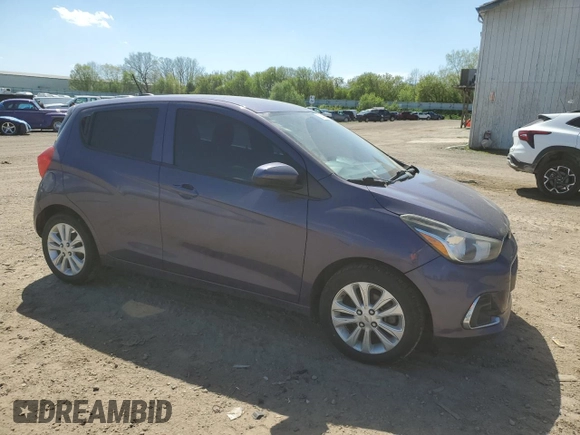 2016 Chevrolet Spark LT with VIN KL8CD6SA4GC557344, listed as a Copart auction lot 52541934 with 102,117 mi miles and Salvage Title. Bid and sale history available at DreamBid. Image 4.