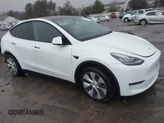 2022 Tesla Model Y Long Range z VIN 7SAYGDEE0NF368362, wystawiony jako IAAI lot #41465147 z przebiegiem 30 219 mil mil oraz . Historia ofert i sprzedaży dostępna na DreamBid. Obrazek 1.